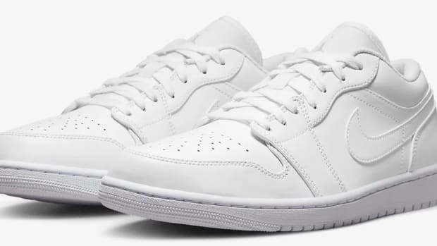 View of white Air Jordan shoes.